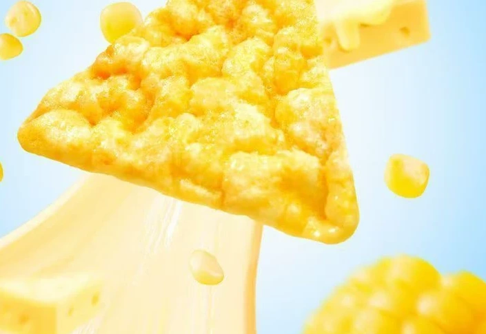 Close detail of a cheese-flavoured triangular corn chip