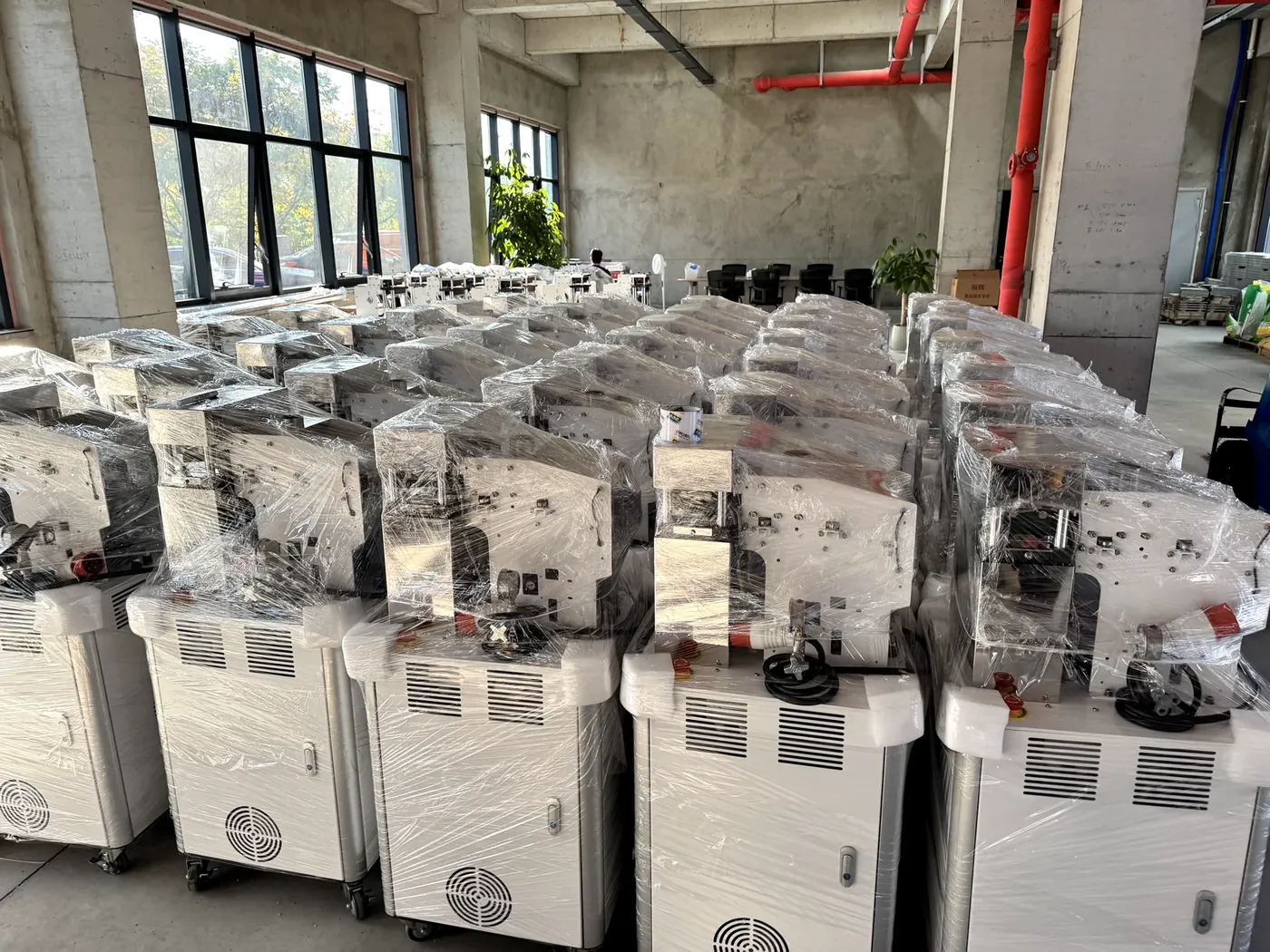 Completed machines wrapped and prepared in the factory